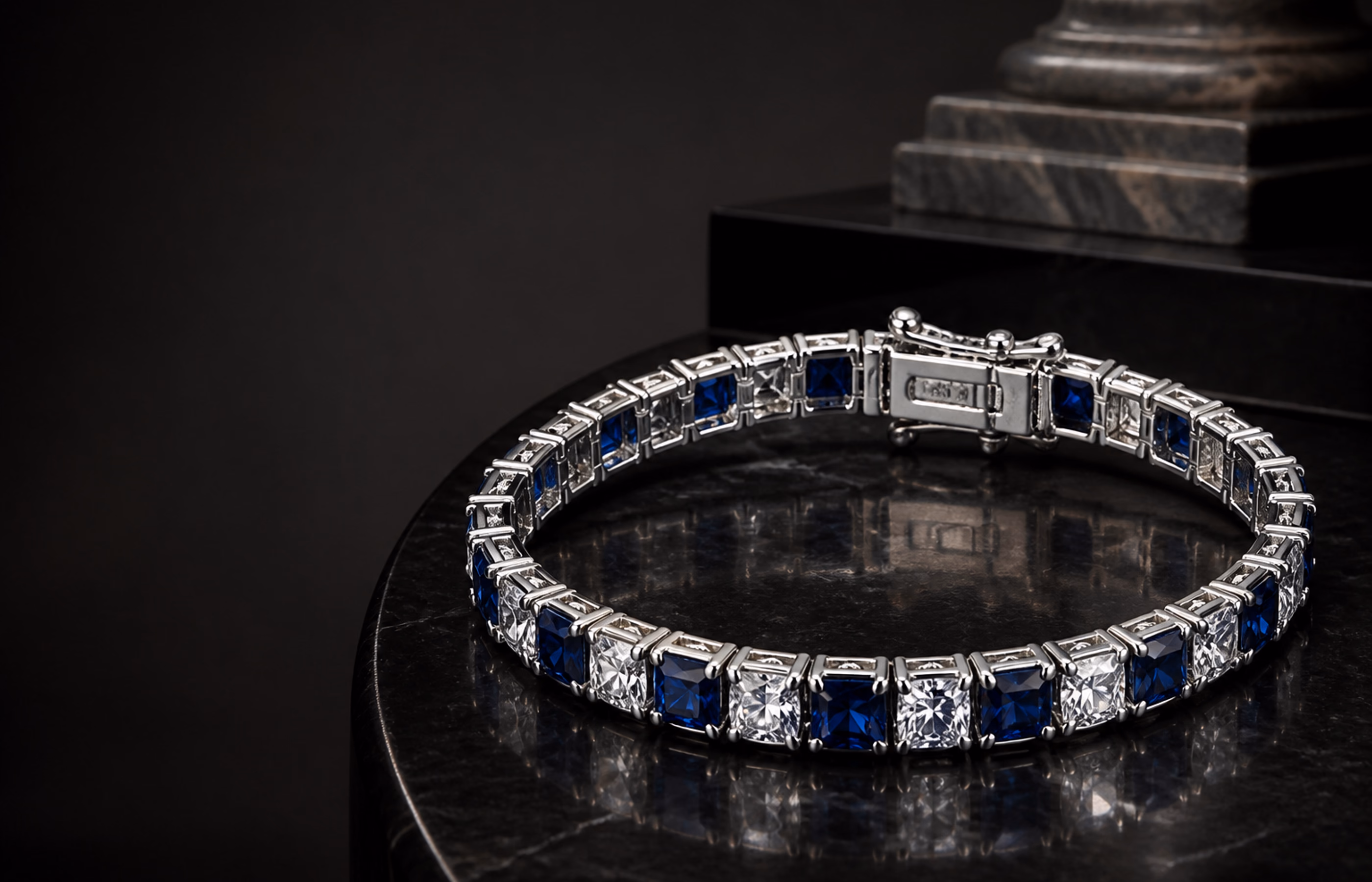 Sapphire and diamond bracelet shown in controlled gallery light.